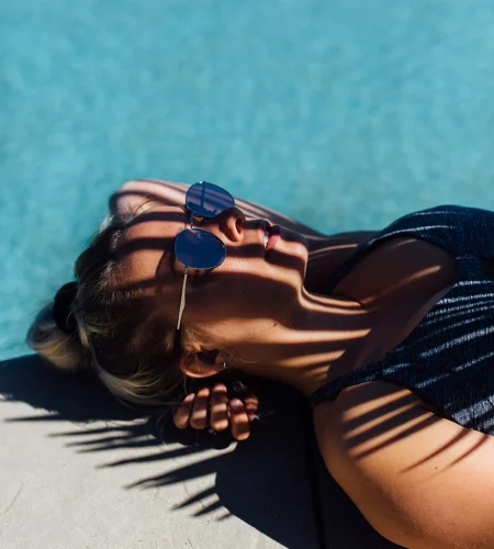 woman-relaxing-poolside